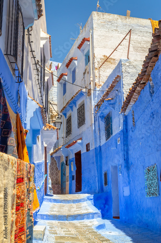 Street in the blue city of Chefchaouen in Morocco © Delphotostock