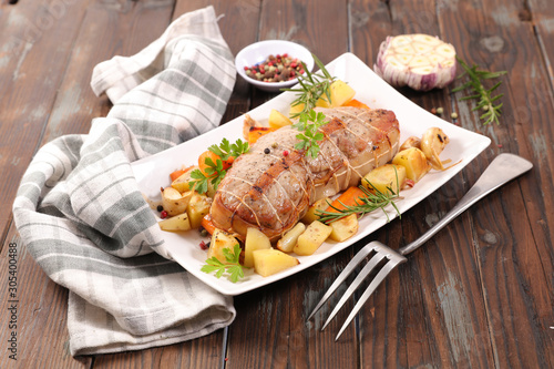 roasted beef or veal with vegetable and herbs