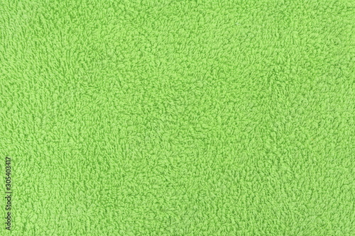 Light green towel texture. Towel surface.