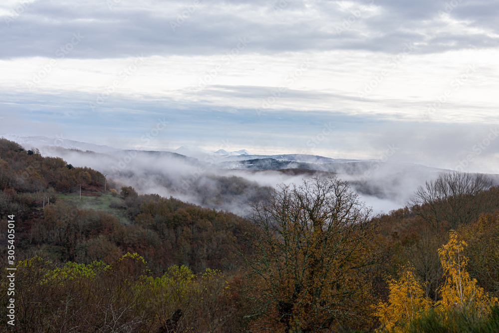 low clouds covering the view of the mountains