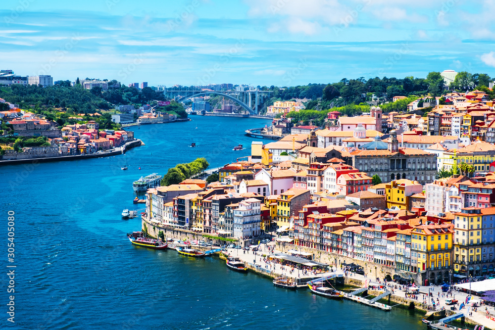Aerial view of Ribeira area in Porto, Portugal during a sunny day with river