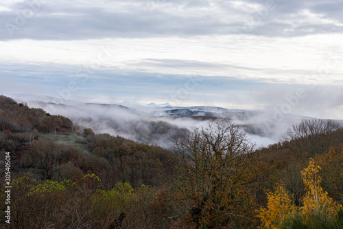 low clouds covering the view of the mountains