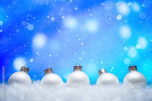 Banner with Christmas white toys and snow backdrop. Christmas discount backdrop. Sale time. © Anton