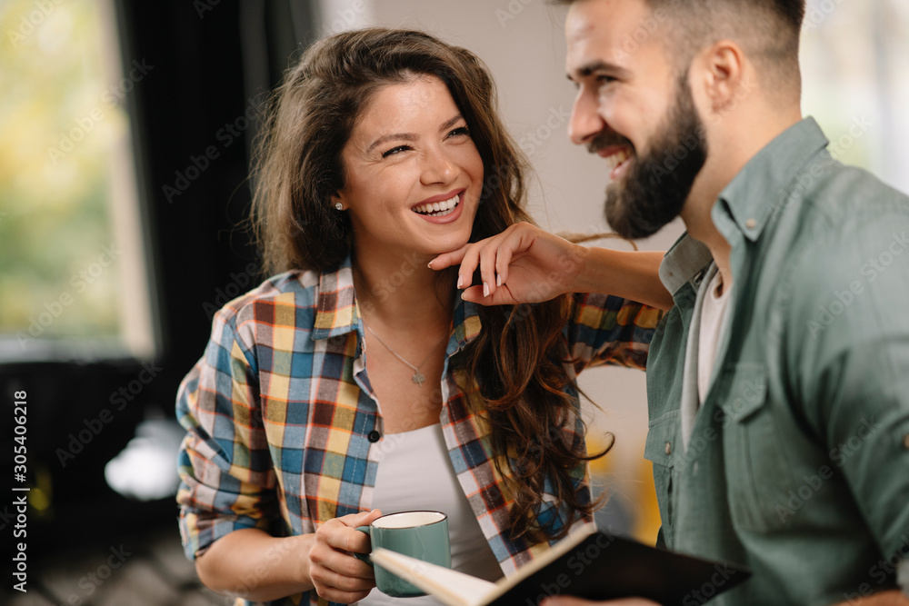 Colleagues in office. Businesswoman and businessman discussing work in office. Two friends in working together. Colleagues in office. Businesswoman and businessman discussing work in office. Two friends in working together.