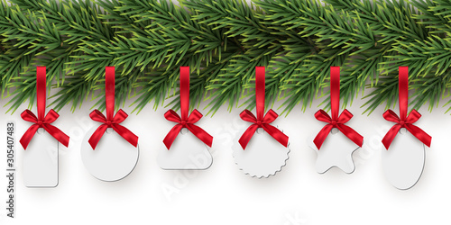 Christmas toys holding on fir tree realistic illustrations set. Winter holidays decorations. New year blank tags, labels with ribbons pack. Various shapes pendants collection isolated on white.
