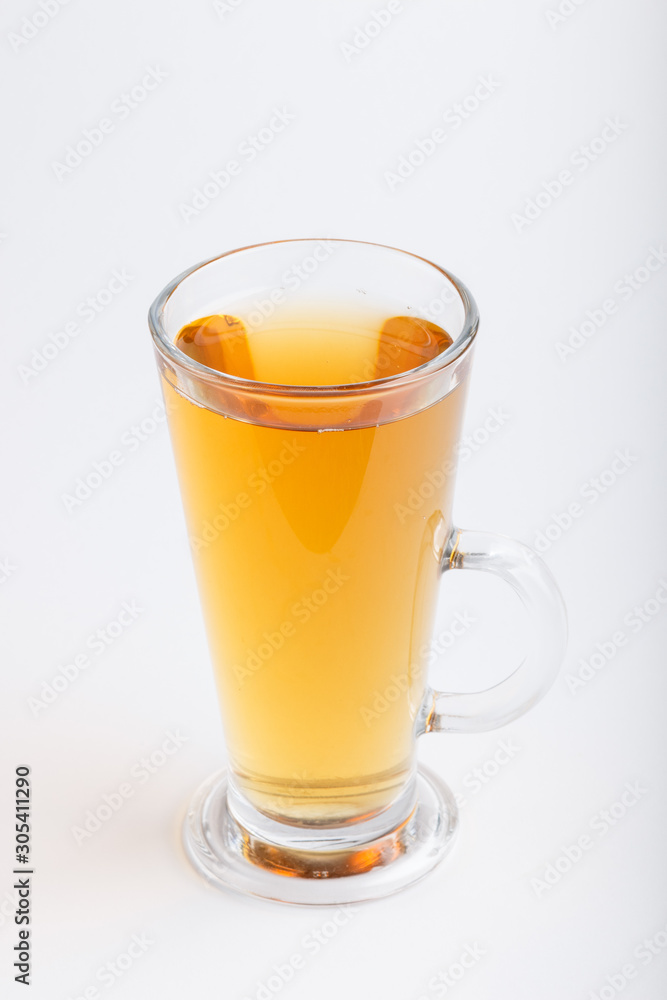 Glass of green grape juice isolated on white background. Side view Glass of green grape juice isolated on white background. Side view