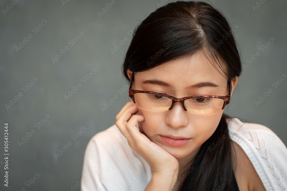 unhappy tired burnout asian business woman, small startup business owner working with laptop computer in coffee shop; concept of small business, woman business owner, working woman with problem unhappy tired burnout asian business woman, small startup business owner working with laptop computer in coffee shop; concept of small business, woman business owner, working woman with problem
