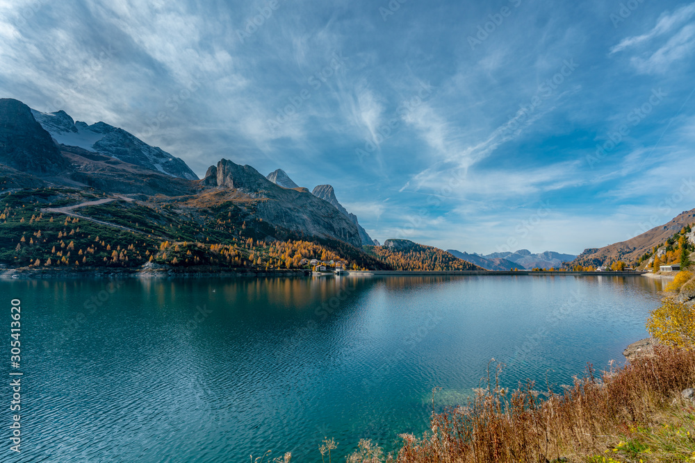 Overlooking the Fedaia lake at the foot of the Marmolada mountains in South Tyrol