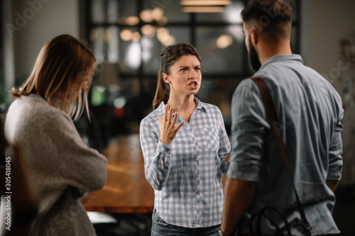 Colleagues arguing in office. Problem in team. Business people at meeting.