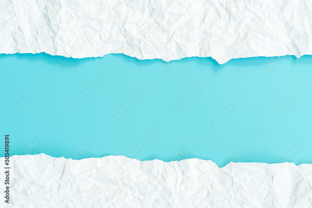 Top view blue sky torn paper on white and grey background. Bank copy space Top view blue sky torn paper on white and grey background. Bank copy space
