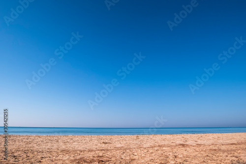 Beautiful sea background tropical sand beach and blue sky in sunny day