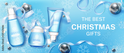 Winter cosmetic christmas gifts tubes mock up banner. Cosmetics bottles on blue background with festive decoration and snowflakes, beauty products gel, cream, lotion. Realistic 3d vector illustration
