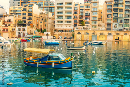 beautiful sea view of harbor at St. Julians to Sliema, Spinola Bay, Malta photo