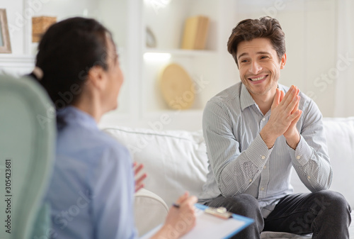 Thankful man sharing his plans with psychotherapist