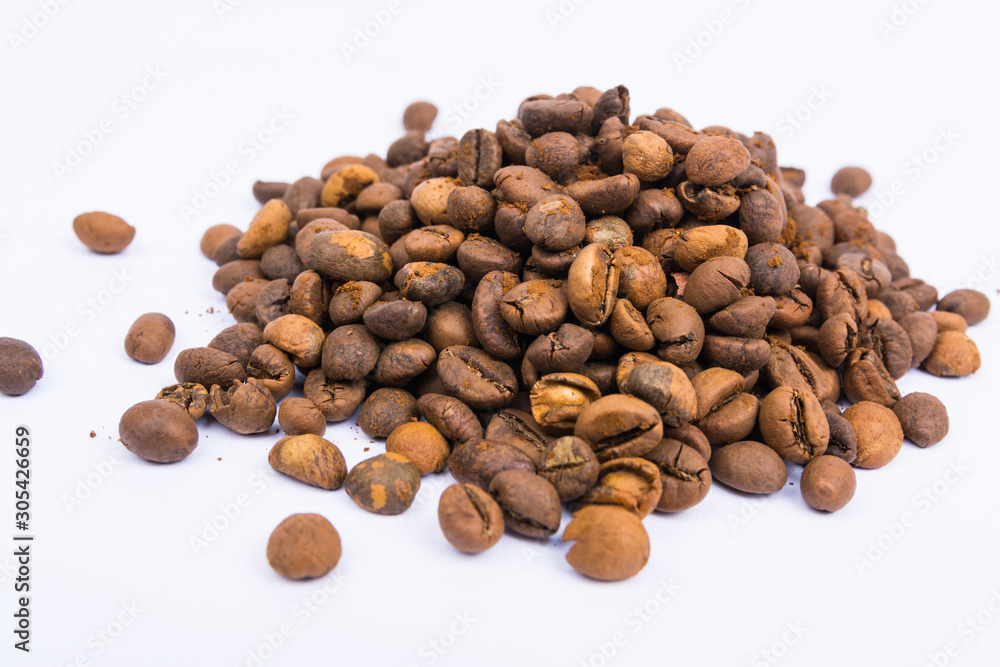 Roasted coffee beans isolated on white background - Image Roasted coffee beans isolated on white background - Image