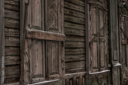 Old wooden window with shutters