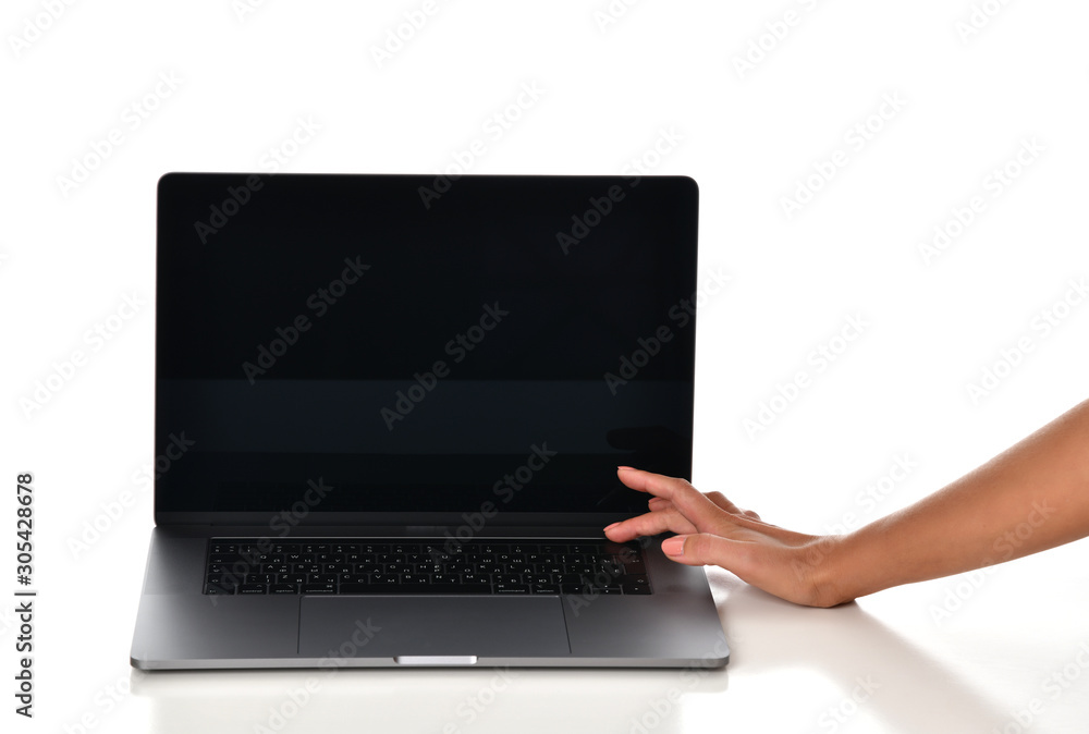 New laptop computer display with keyboard blank black screen and hand unlock it with touch id New laptop computer display with keyboard blank black screen and hand unlock it with touch id