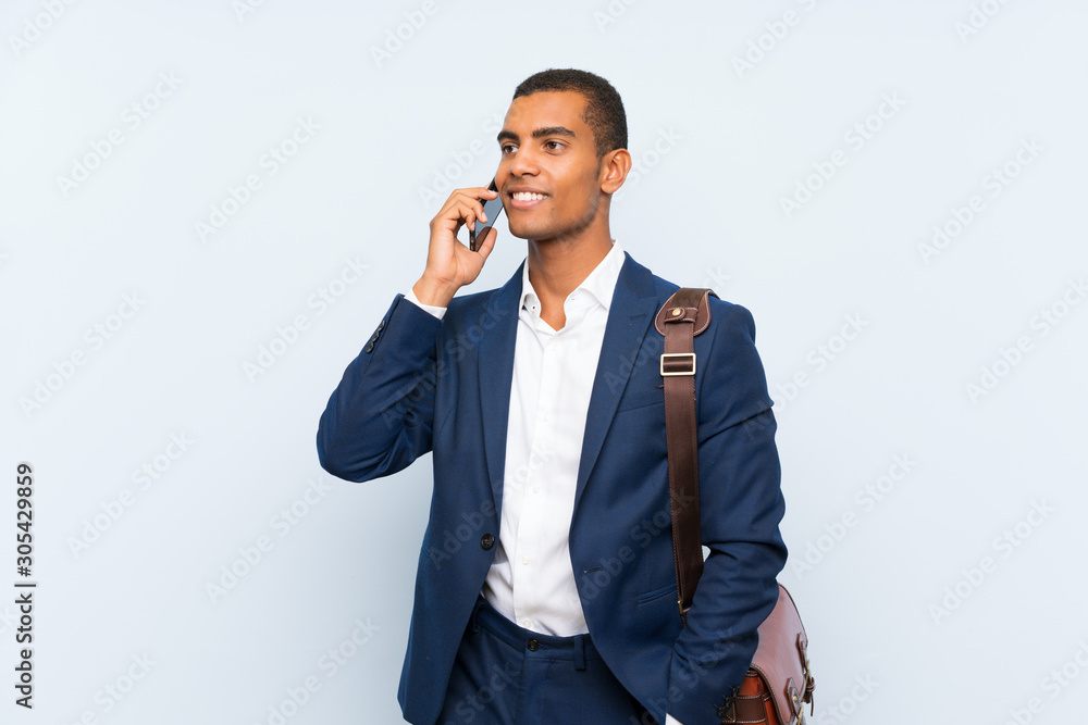 Businessman over isolated blue background