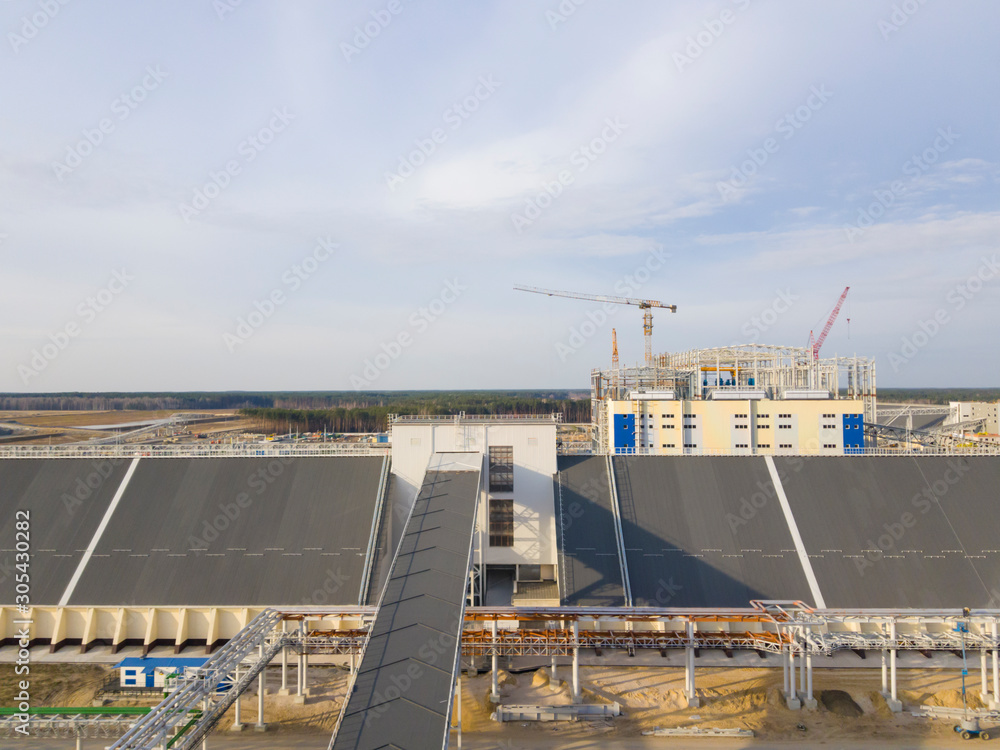Warehouse for ore storage. Mining and processing plant. Sylvinite mining. Building. Petrikov District, Republic of Belarus.