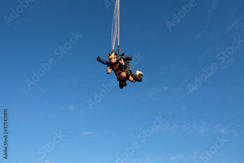 Fototapeta Naklejka Na Ścianę i Meble -  Tandem skydiving. The active lifestyle.