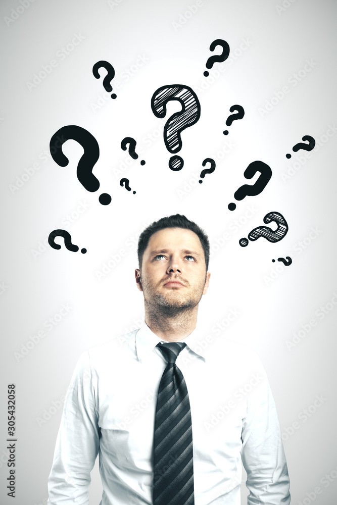 Businessman with drawing question mark Businessman with drawing question mark