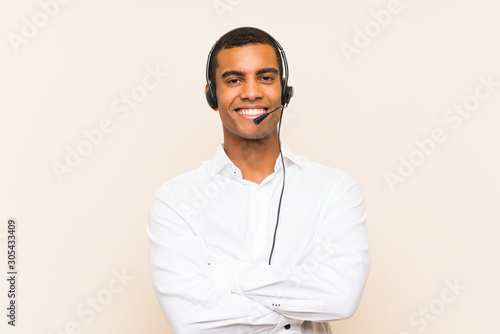 Obraz na płótnie Young brunette man working with a headset