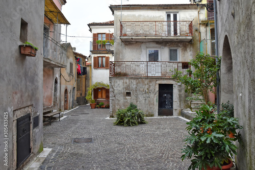 Fornelli  11 23 2019. A narrow street among the old houses of a mountain village in the Molise region