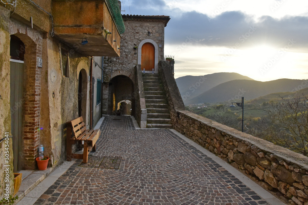 Fornelli, 11/23/2019. A narrow street among the old houses of a mountain village in the Molise region