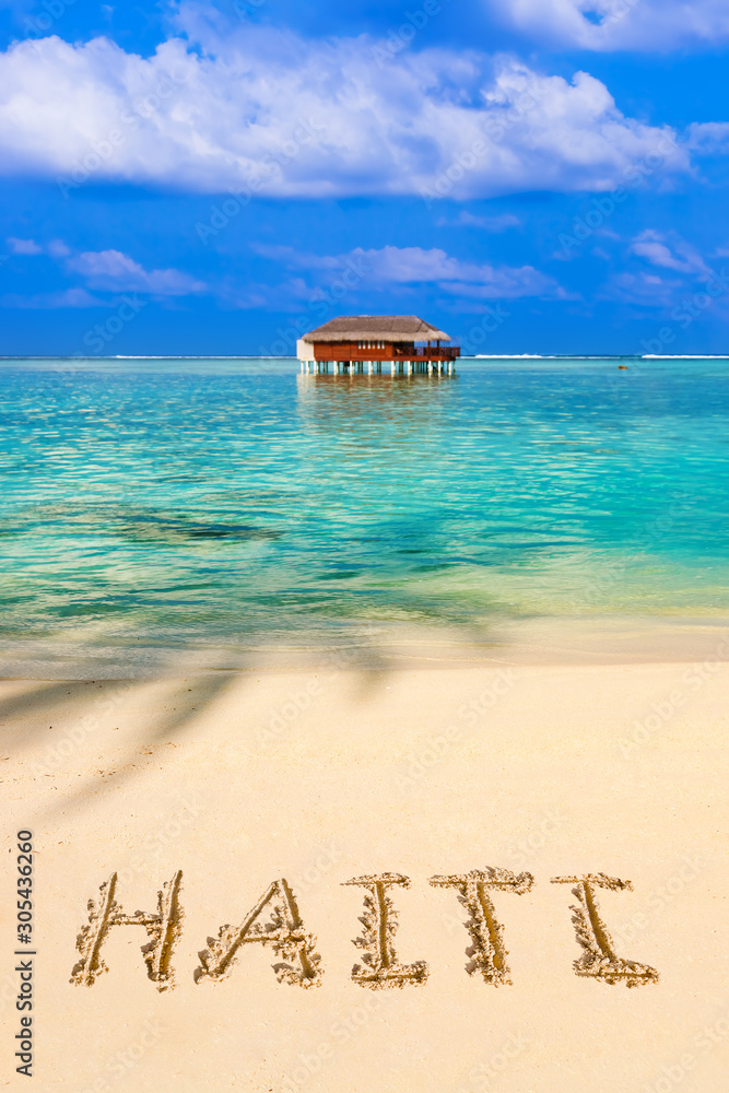 Fototapeta premium Word Haiti on beach