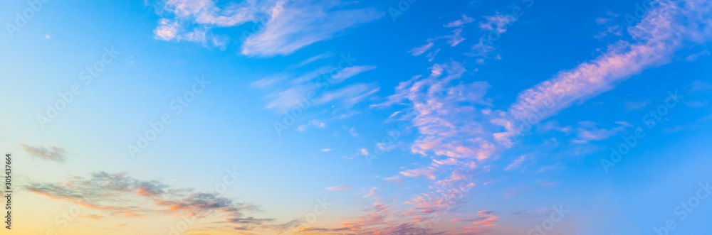 Panorama of beautiful sunset sky with clouds in windy day. Panorama of beautiful sunset sky with clouds in windy day.