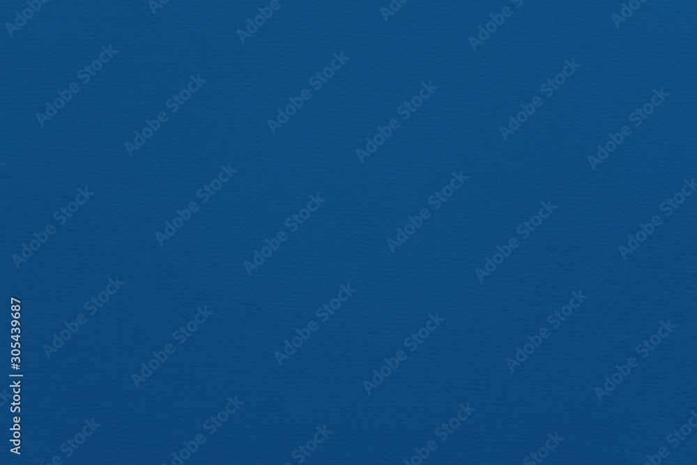 Color of the year 2020. Texture of classic blue colored paper for watercolor and pastel. Fashionable pantone color of spring-summer 2020 season. Modern luxury background, mock up with space for text Color of the year 2020. Texture of classic blue colored paper for watercolor and pastel. Fashionable pantone color of spring-summer 2020 season. Modern luxury background, mock up with space for text