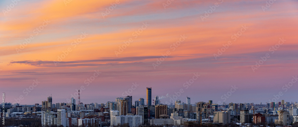 Fototapeta premium Dawn clouds over the metropolis of early winter sunset 6