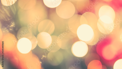 Christmas tree bokeh blur abstract background for merry x'mas party and new year celebration in red green gold color for xmas holiday night light  © Chinnapong