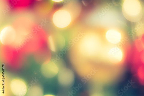 Christmas tree bokeh blur abstract background for merry x'mas party and new year celebration in red green gold color for xmas holiday night light  © Chinnapong