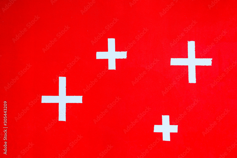 white plus on red watercolor on cement white plus on red watercolor on cement