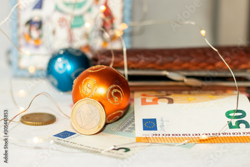 Cash costs for New Year's gifts and Christmas. Christmas balls,