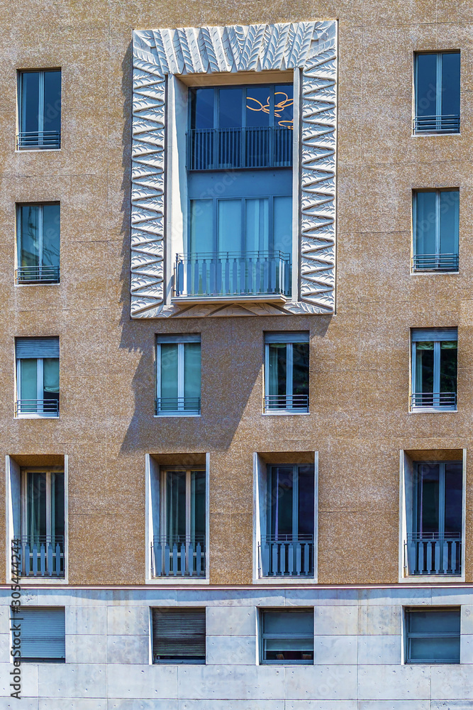Facade of a building in Piazza S.Babila, Milan, Italy