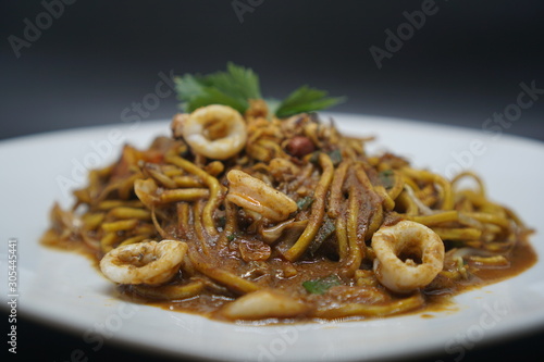 mie aceh traditional noodle with squid