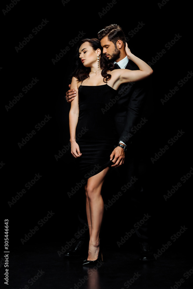 bearded man with closed eyes touching dress of girlfriend on black bearded man with closed eyes touching dress of girlfriend on black
