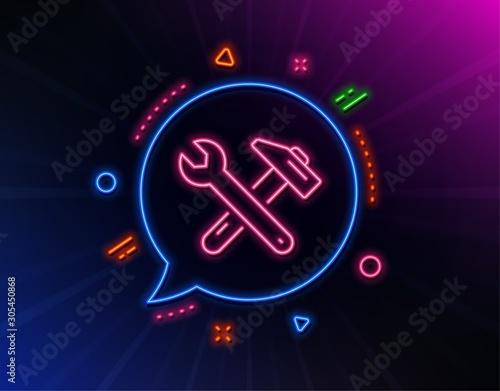 Spanner and hammer line icon. Neon laser lights. Repair service sign. Fix instruments symbol. Glow laser speech bubble. Neon lights chat bubble. Banner badge with spanner tool icon. Vector