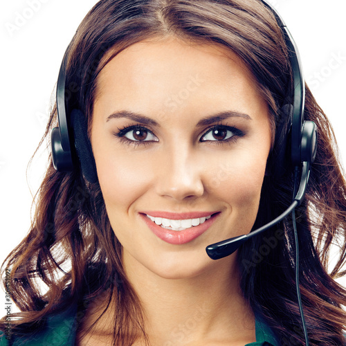 Female support phone operator or sales agent, isolated over white background. Brunette girl in green clothing and headset, looking straight to camera. Call center concept. Square composition.