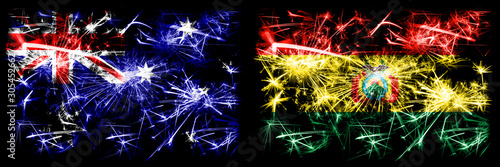 Australia, Ozzie vs Bolivia, Bolivian New Year celebration sparkling fireworks flags concept background. Combination of two abstract states flags. © Vlad
