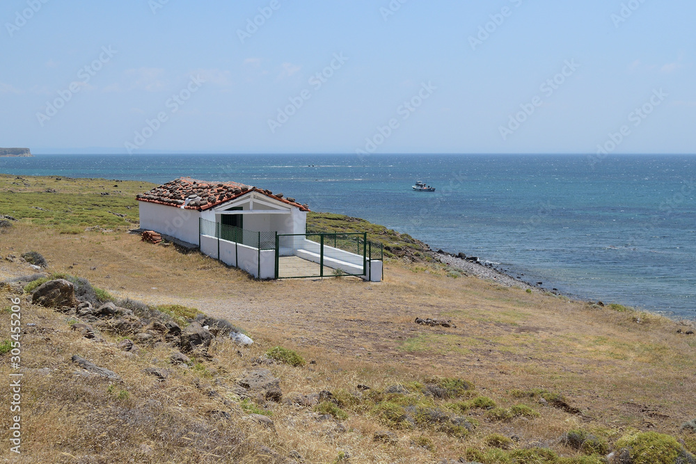 Seascape from turkish aegean island Gokceada - white greek chapel on the shore