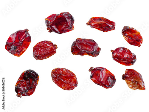 Some dried cranberries isolated on white background with copy space for text or images. Food, cooking, packaging concept. Close-up.