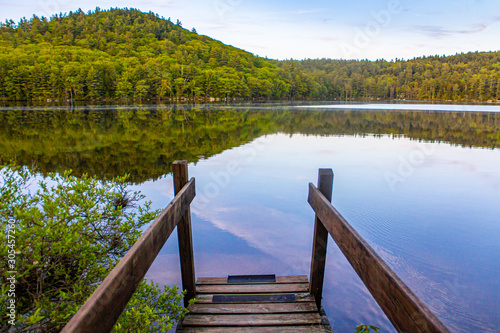 Small dock over lake in New Hampshire