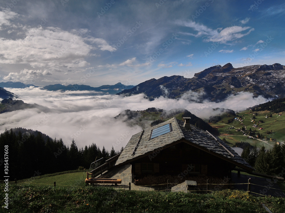 Obraz premium Views of the cloudy valley from the Col des Mosses in the Bernese Alps of Switzerland