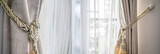 White curtain decoration on the door with blinds.