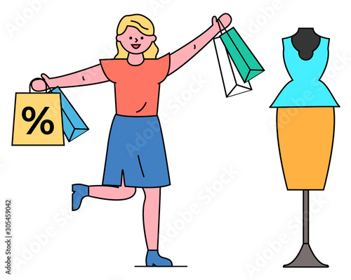 Woman in store buying clothes vector, isolated character holding bags with percent offers symbol. Lady standing by mannequin with classical clothing at display. Trendy costume in store on sale