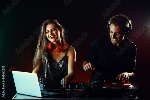 Young djs playing music in ...