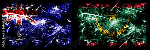 Australia, Ozzie vs Mauritania, Mauritanian New Year celebration sparkling fireworks flags concept background. Combination of two abstract states flags. © Vlad
